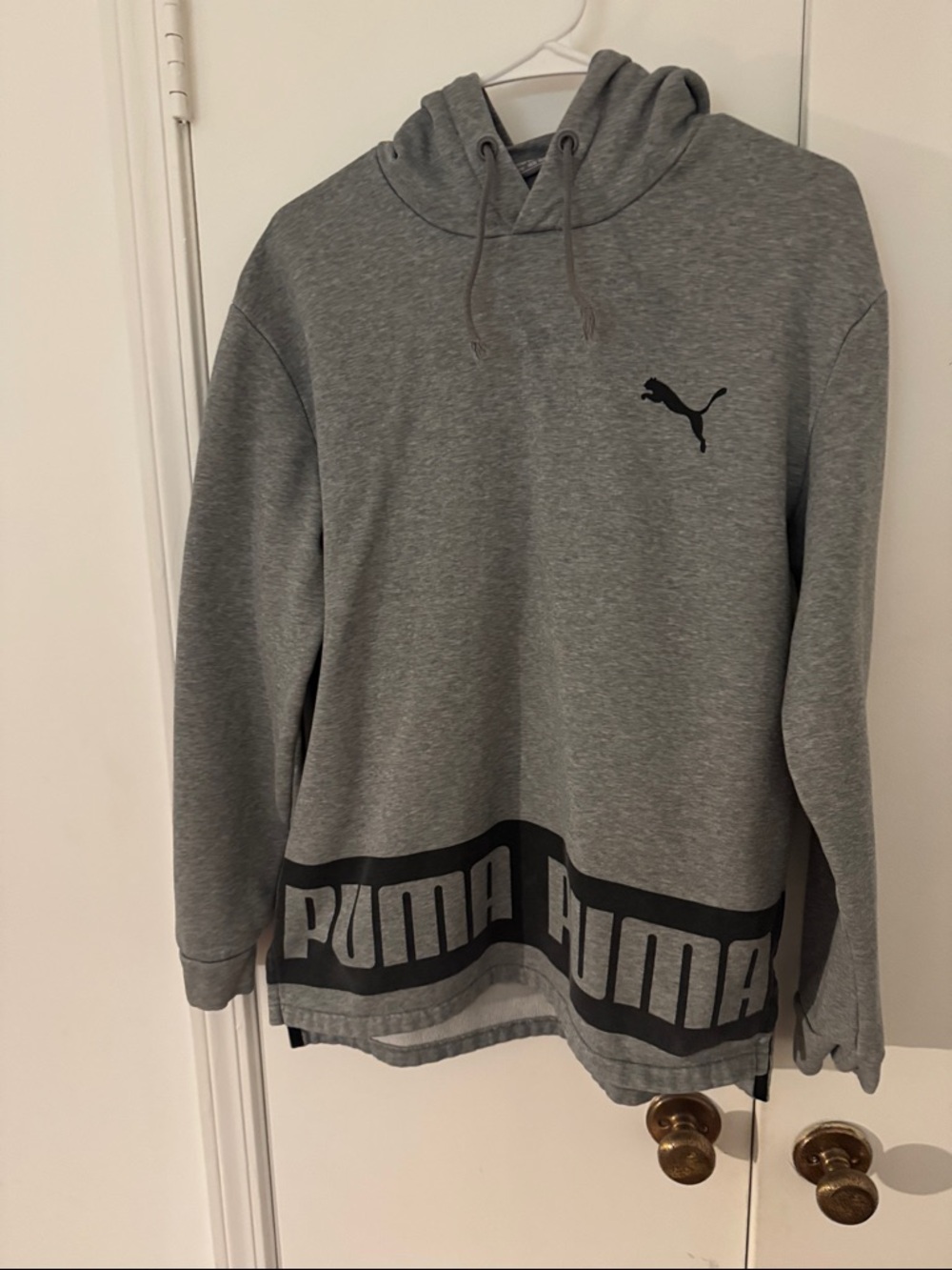 Puma Gray Pullover Hoodie with Black Logo and Hem Print